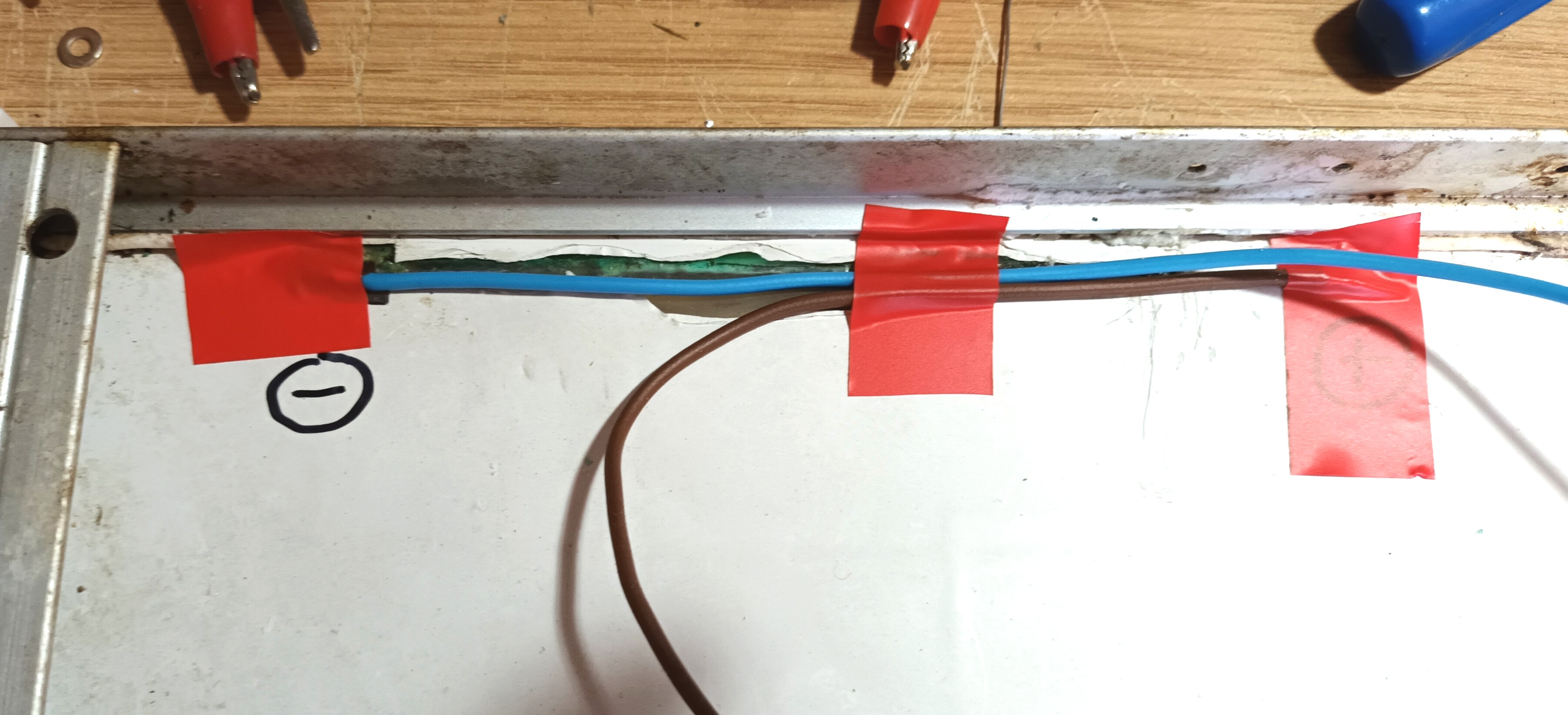click to enlarge Temporary Fixing Of New Solar
Panel Wiring Prior To Initial Glue Application
