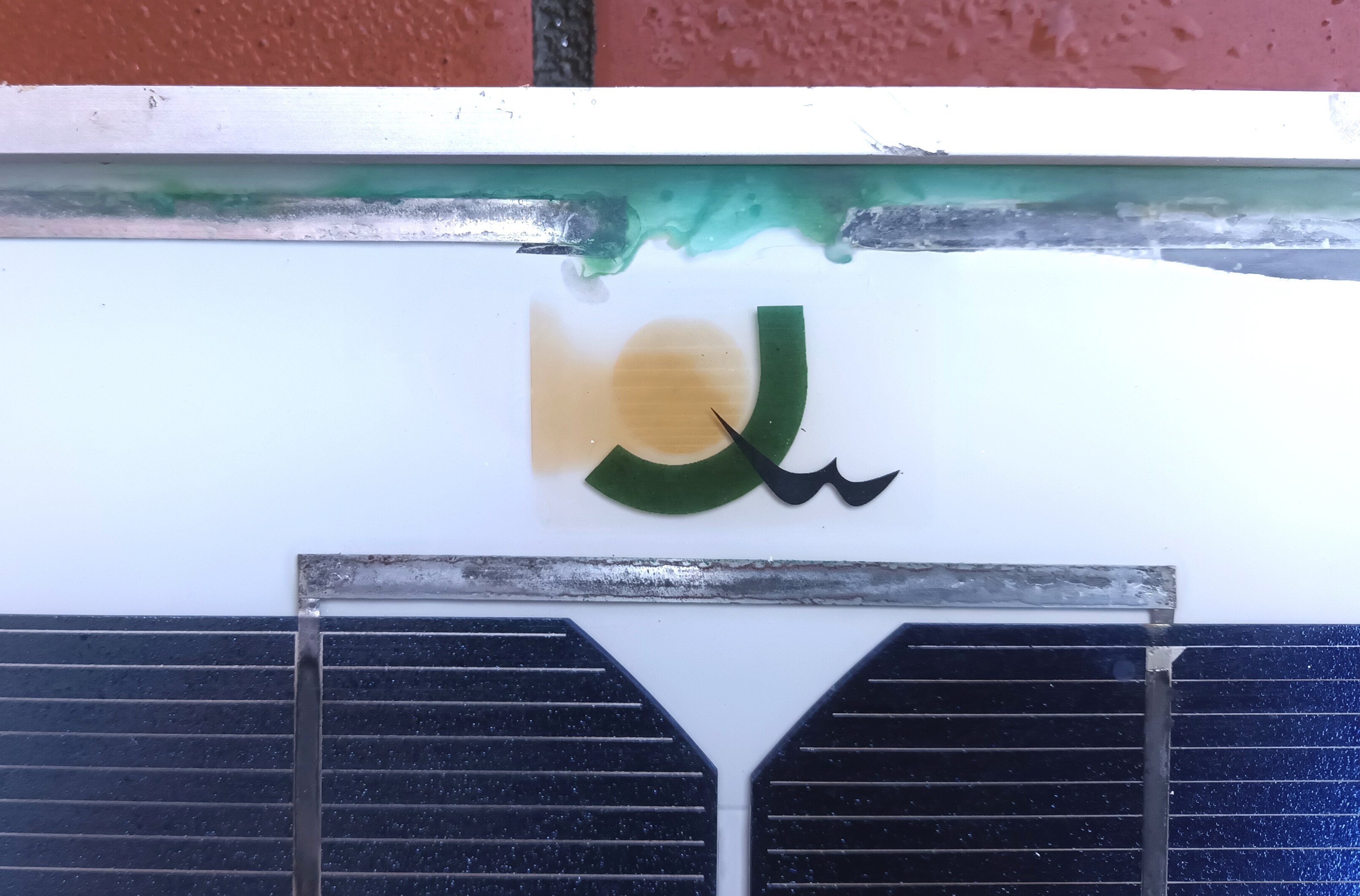 click to enlarge Green Transparent Silicone
Sealant Showing Copper Ion Contamination From Water Ingress
On A 12V Solar Panel